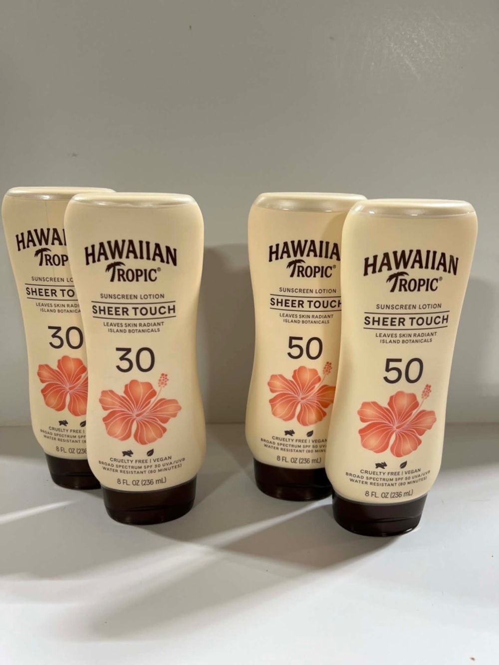 (4) Hawaiian Tropic Sheer Touch Sunscreen Lotion SPF 30 & 50 - Cream/Coral
